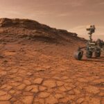 Imagem editorial para a matéria: Curiosity encontra formações em padrão de favo de mel durante exploração em Marte