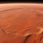 Imagem editorial para a matéria: ESA mostra sobrevoo em 3D da cratera Schiaparelli em Marte