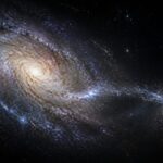 Imagem editorial para a matéria: Hubble e Gaia indicam fusão de galáxia anã com a Via Láctea jovem
